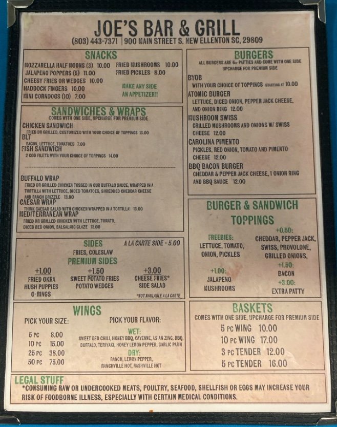 Printed menu showing burgers and fries.