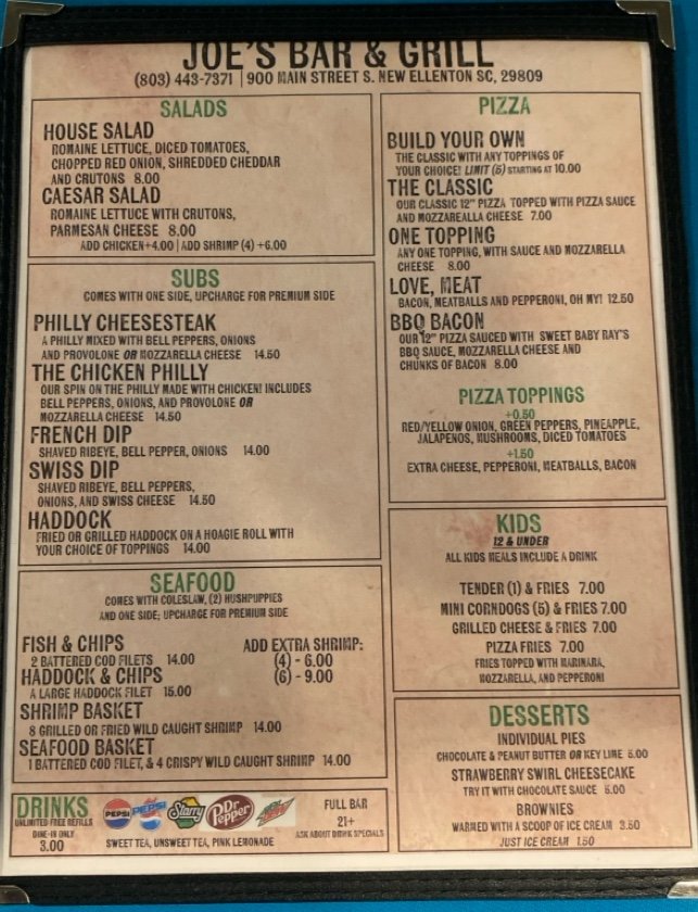 Food menu with comfort dishes and sides.